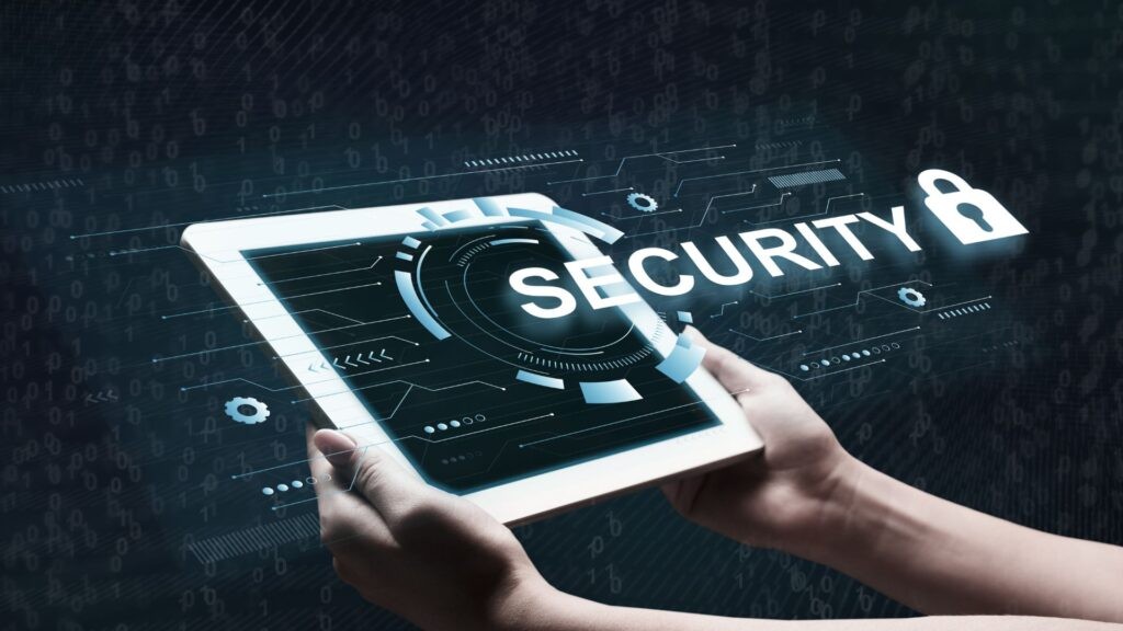 Alt Text: Hands holding a tablet with digital security graphics, representing managed IT services and cyber protection for businesses in Sunshine Coast and Brisbane.