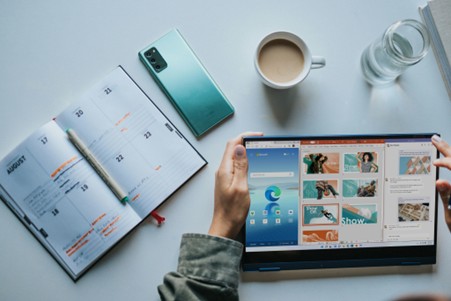 Microsoft 365 tools in use by a small business professional" title="Microsoft 365 for small business in action on a digital workspace