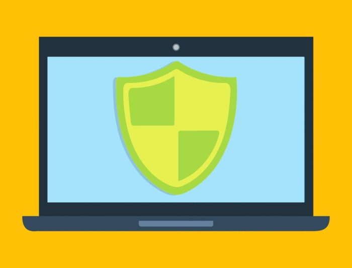 Laptop security shield protecting against fake recruiter scams on LinkedIn targeting businesses